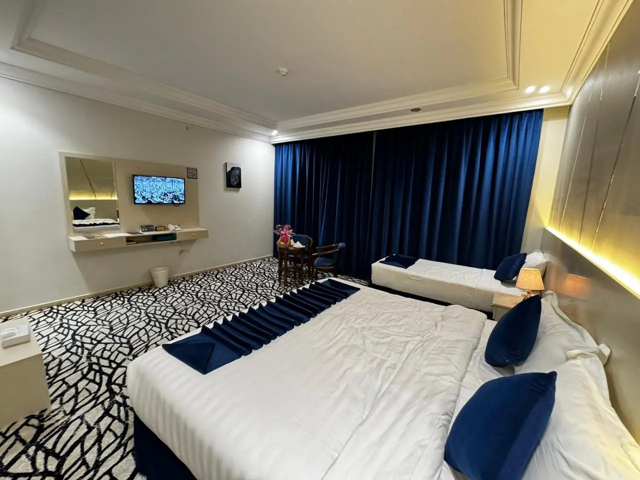 Exterior view of the Swissotel Al Maqam Makkah, situated within the Abraj Al Bait complex.