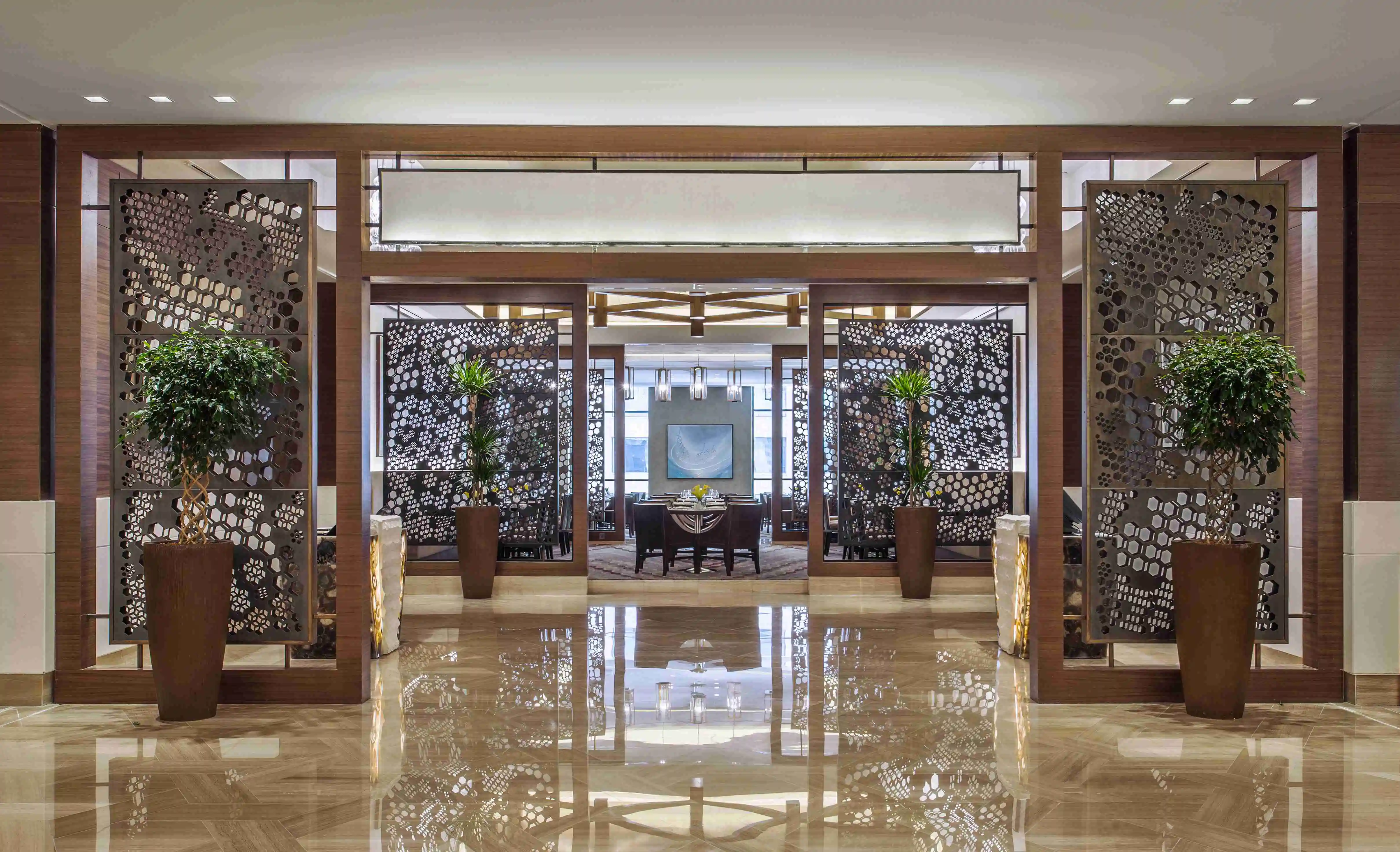 A view of the modern and vibrant interior seating area at Oasis Restaurant