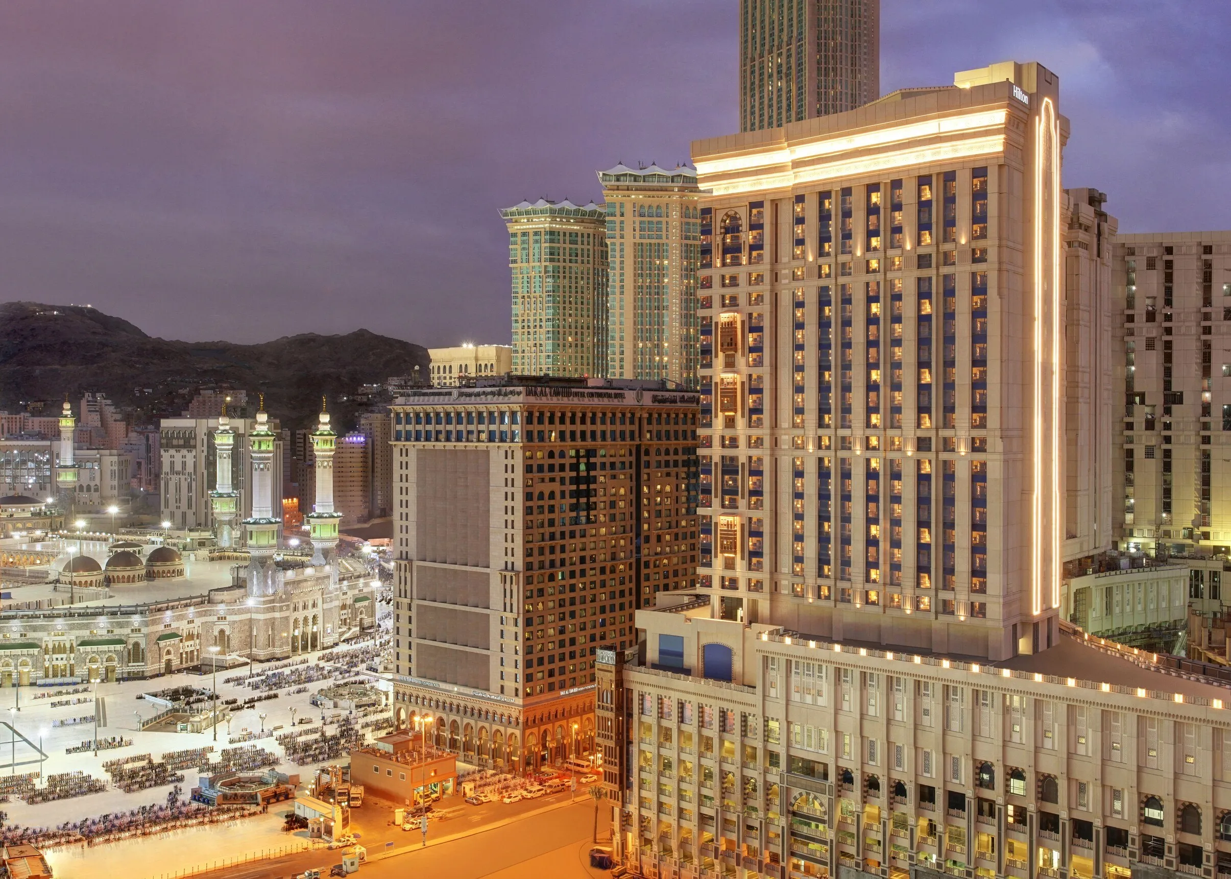 Exterior view of the Hilton Suites Makkah hotel building, known for its strategic location.